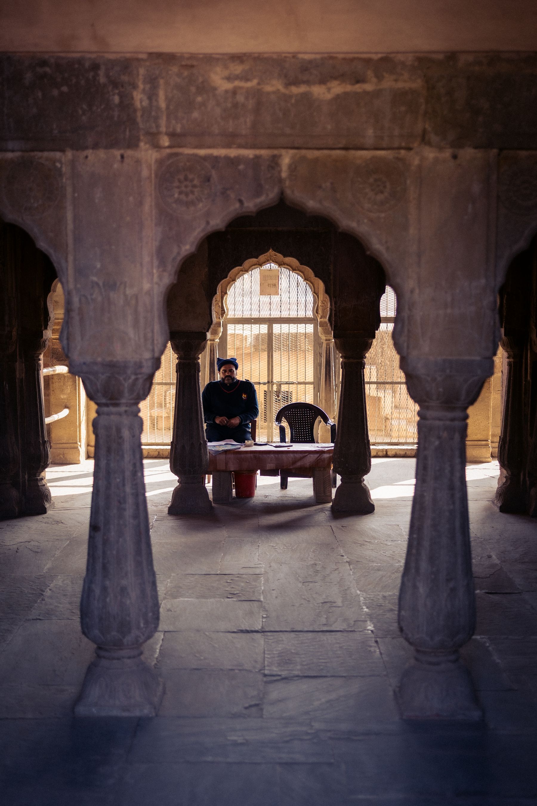 Dozing Security Guard and Empty Chair